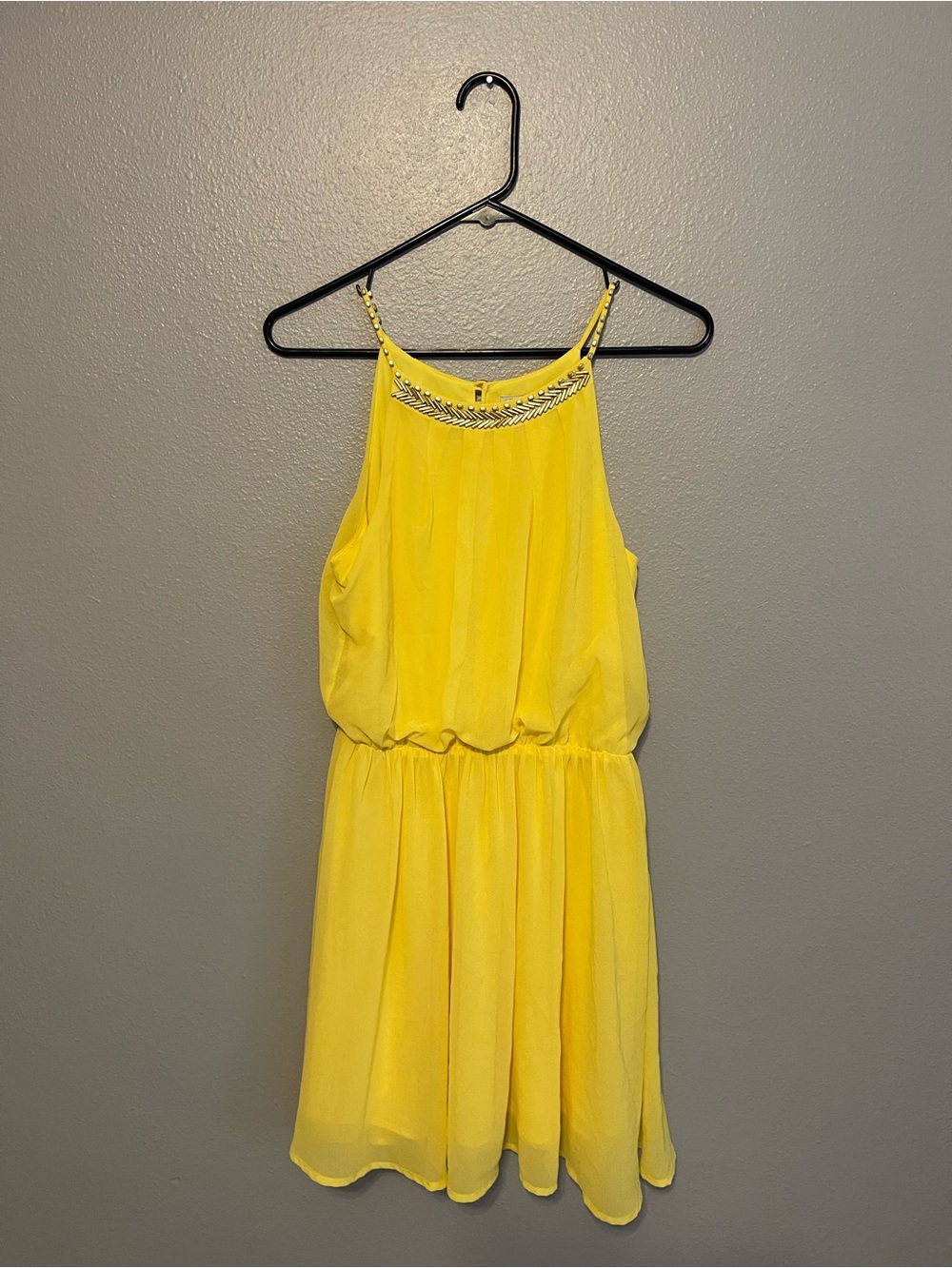 the clothing company Bright Yellow Halter Dress